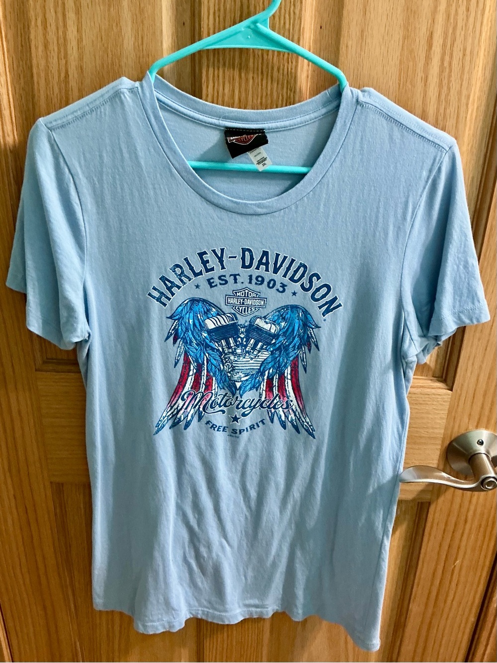 Ladies Harley-Davidson Light Blue Short Sleeve Tee with Red & Blue Wing Graphic